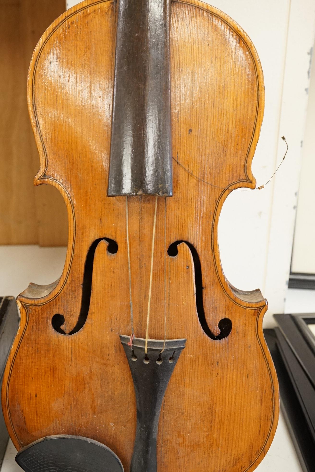 A 19th century violin, and a cased Boosey & Hawkes clarinet